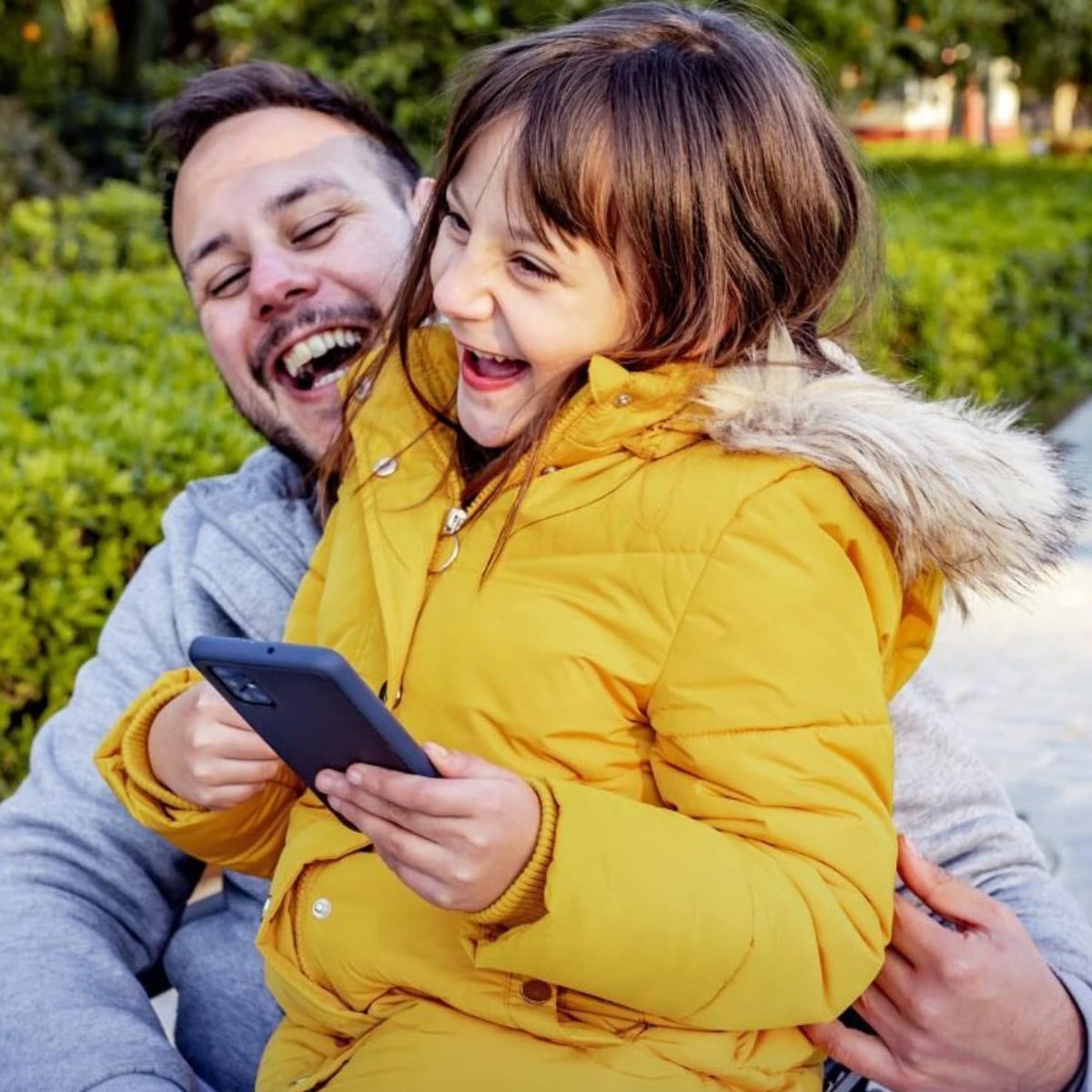 Girl and Dad smiling
